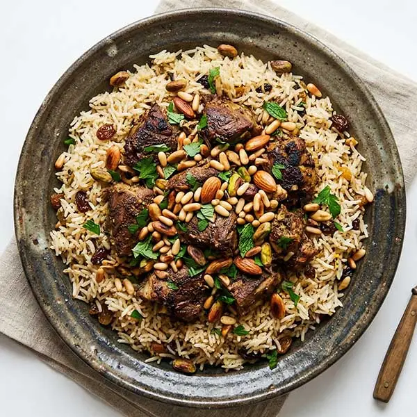 Lamb Ouzi With Oriental Spiced Rice & Roasted Nuts